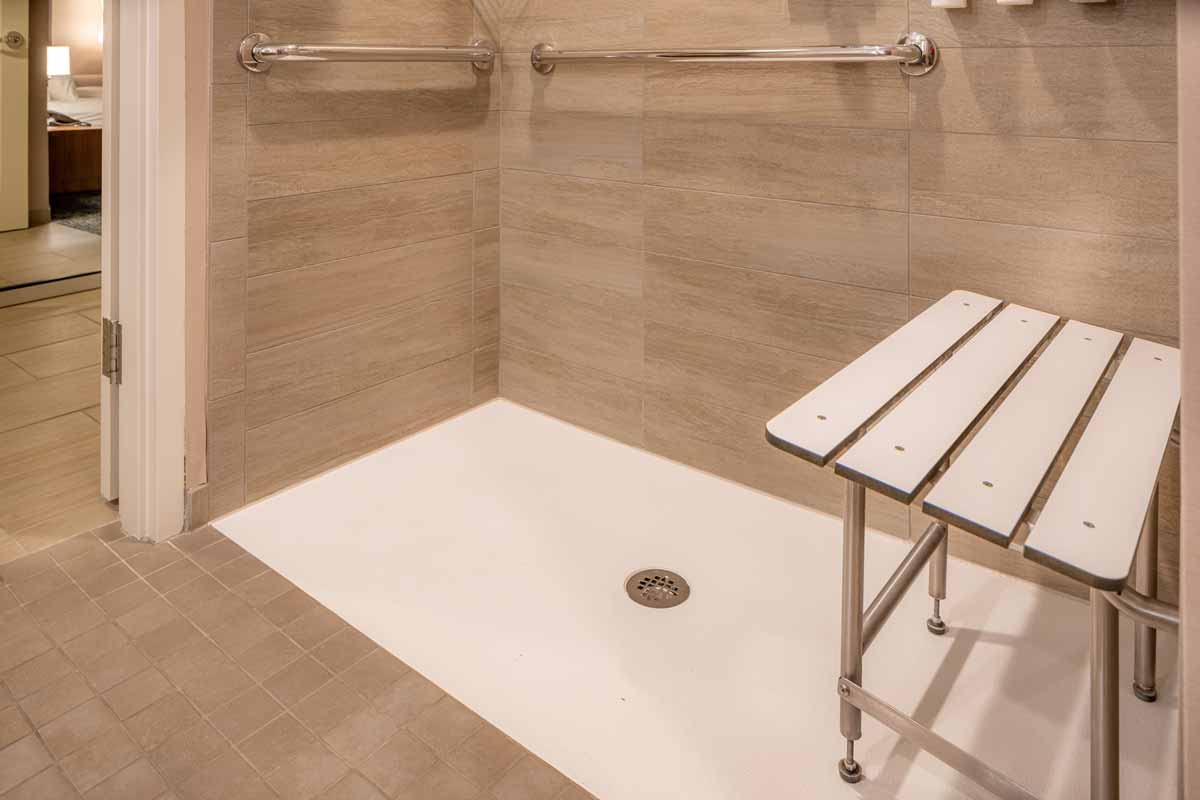 Accessible shower added to bathroom as part of age-in-place renovation by Dream Space Renovation LLC
