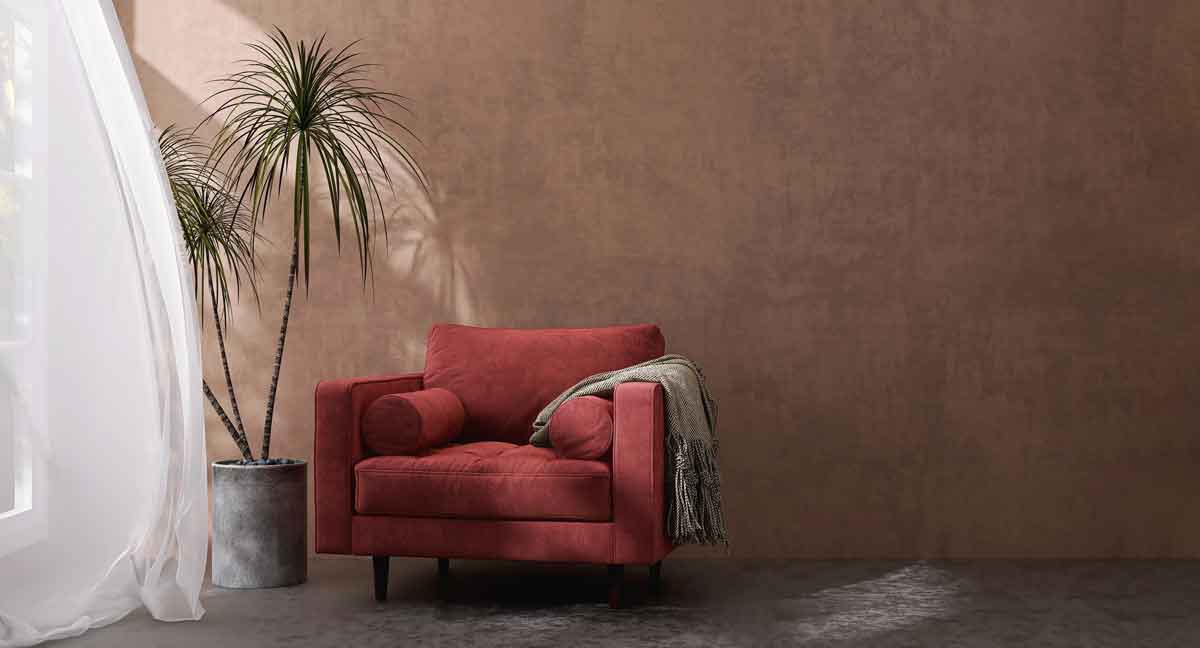 Couch in front of Venetian plaster wall